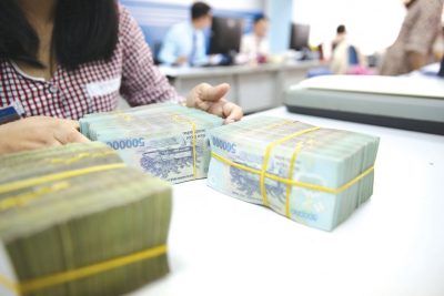 NHNN cho biết các ngân hàng thương mại có thanh khoản tốt hơn và cung cấp lãi suất thấp hơn sẽ được phép tăng trưởng tín dụng cao hơn.